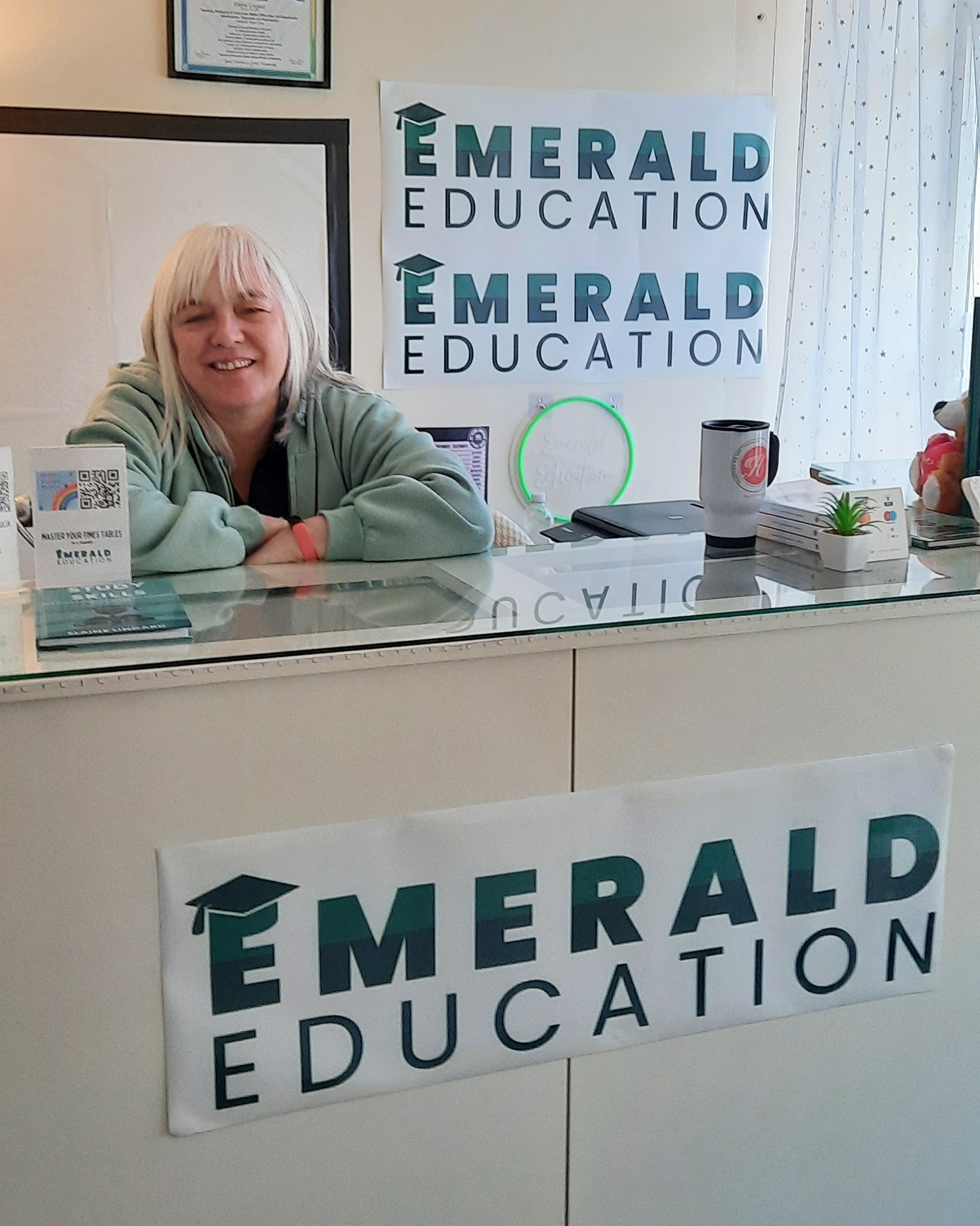 Elaine at recemtopn desk in Emerald Education Centre